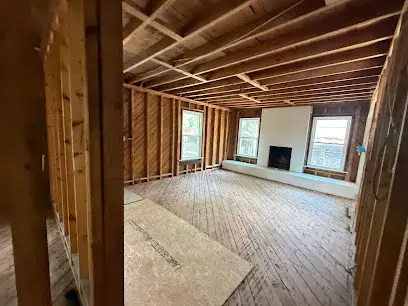 Room opened to the studs and ceiling joists during Oak Ridge water damage drying